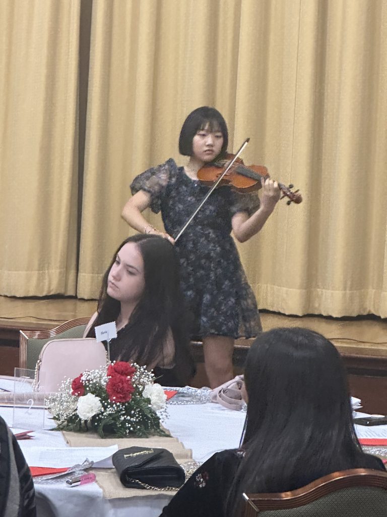 Violin Concerto at the benefit held at Dominican Village for the Ujima Internship Program.