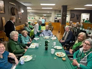 Residents enjoying St. Patrick's Day 2024 at the Dominican Village pub